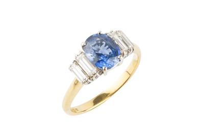 Lot 73 - A sapphire and diamond dress ring, the oval...