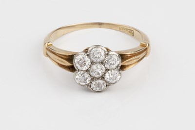Lot 71 - A diamond flowerhead cluster ring, the old...