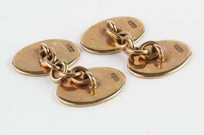 Lot 205 - A pair of cufflinks, with oval panels and...