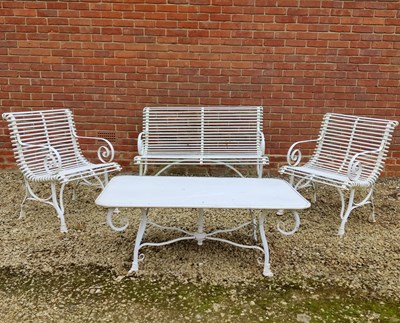 Lot 551 - A set of white painted wrought iron French style garden furniture