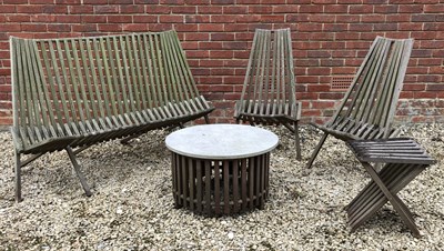 Lot 584 - A set of modernist teak garden furniture