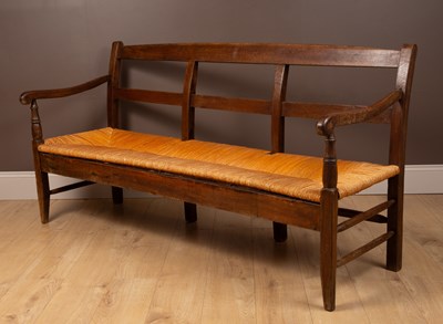 Lot 320 - An 18th century oak settle