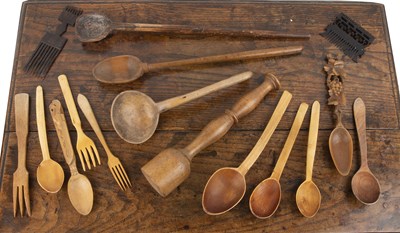 Lot 246 - Group of treen and wooden ladles Indian combs...