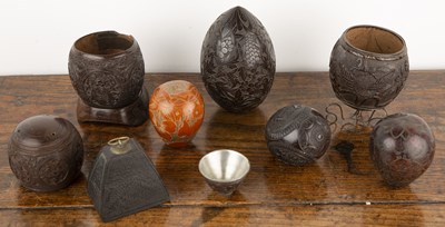 Lot 200 - Group of carved coconut cups and related...