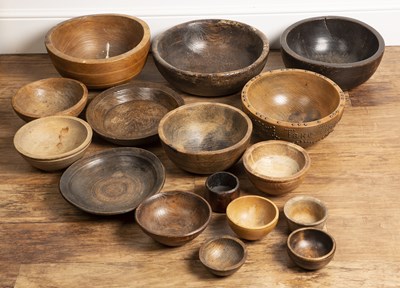 Lot 197 - Group of treen and wooden bowls including an...