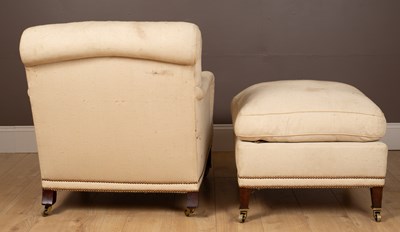 Lot 358 - A Howard & Sons armchair and stool