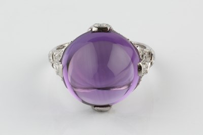 Lot 180 - An amethyst and diamond dress ring, the...
