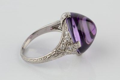 Lot 180 - An amethyst and diamond dress ring, the...