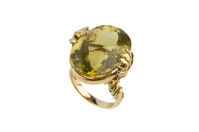 Lot 154 - A yellow quartz single stone dress ring by...