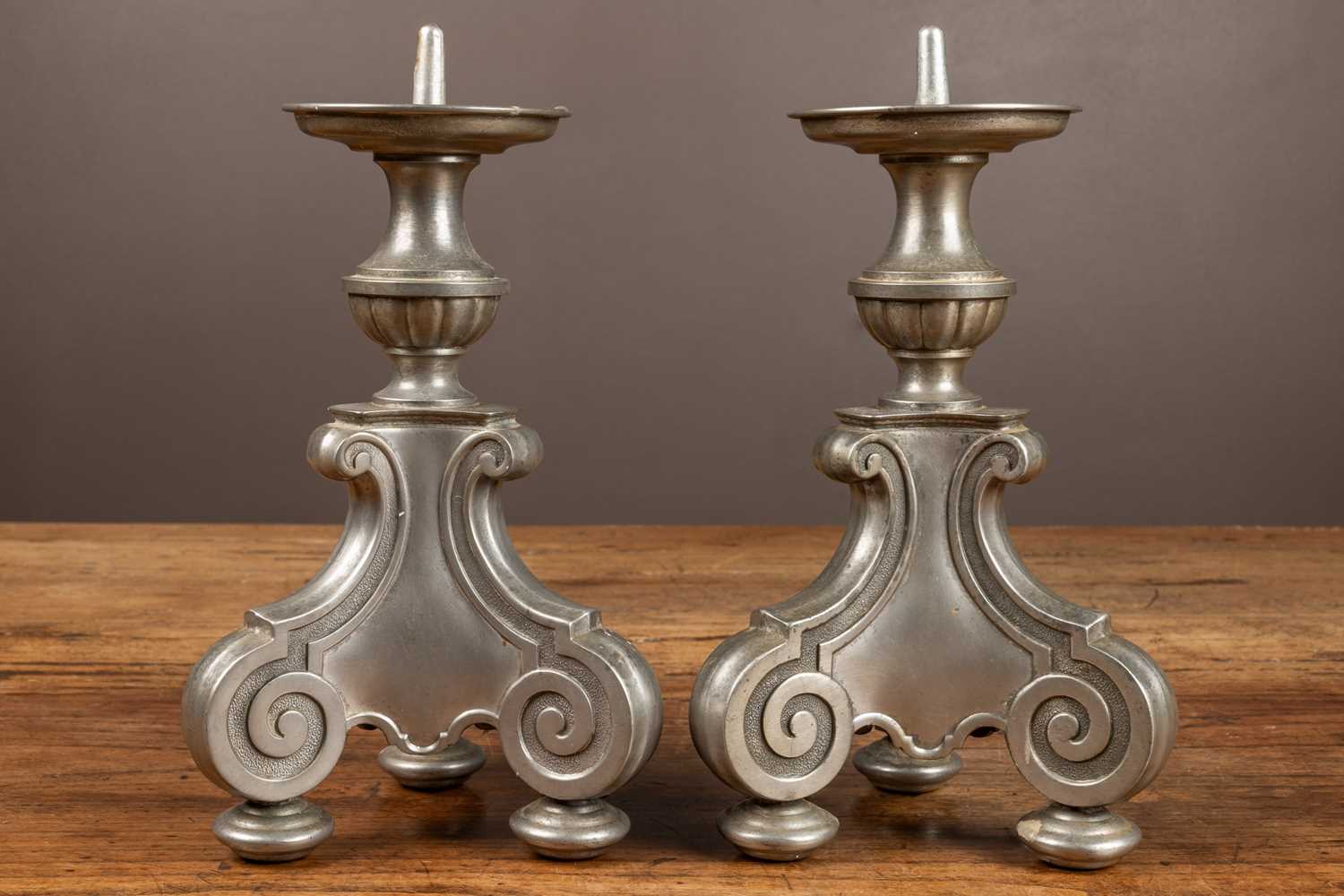 Lot 120 - A pair of pewter Svenskt Tenn candlesticks