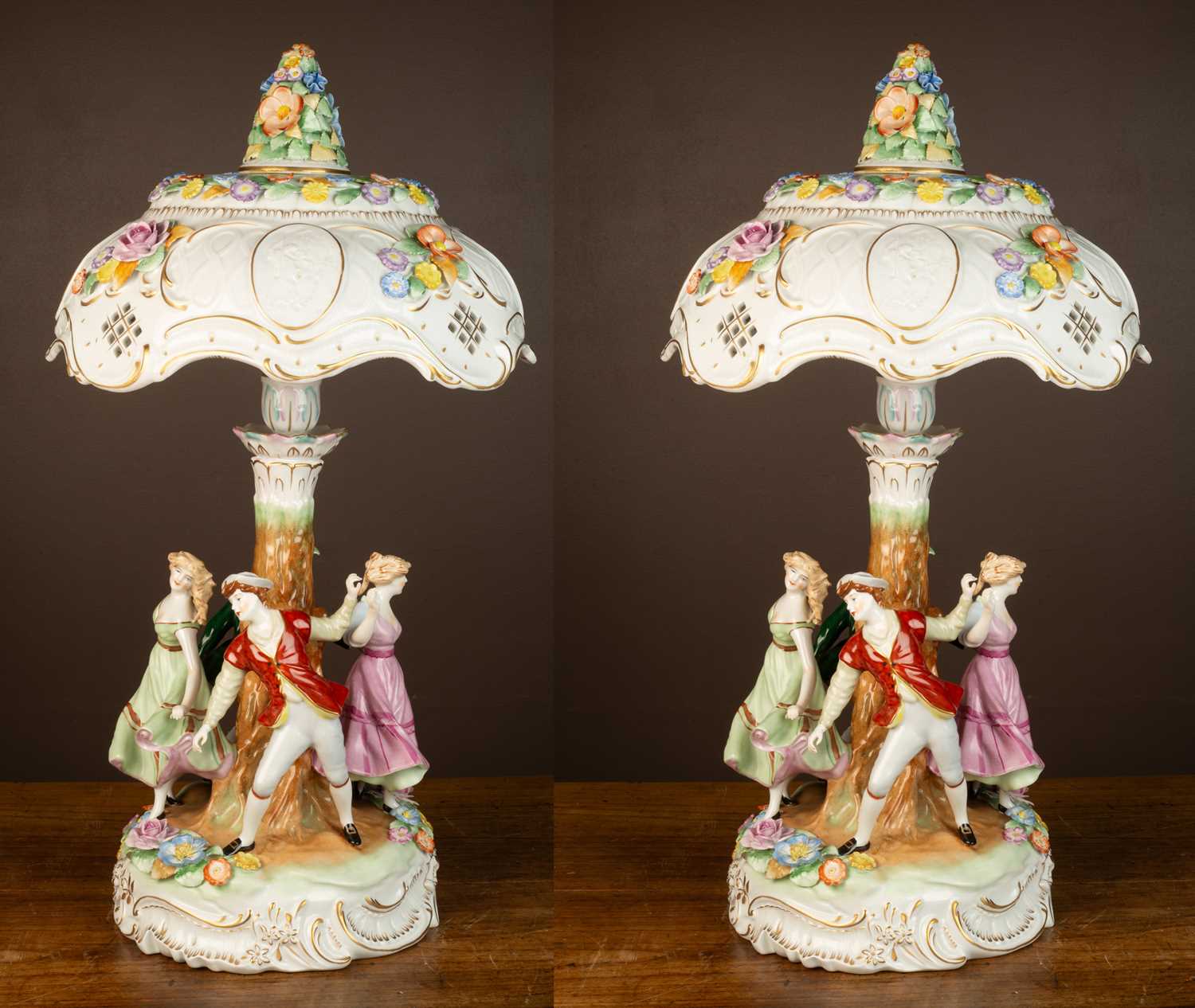 Lot 339 - A pair of 20th century German porcelain figural table lamps