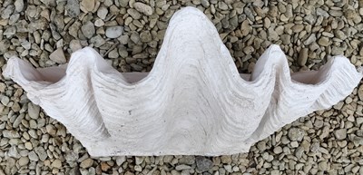 Lot 534 - A cast composite giant clam shell