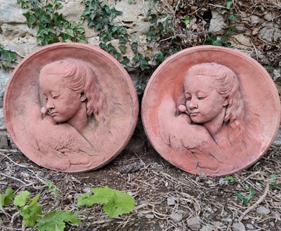 Lot 502 - Two terracotta roundels