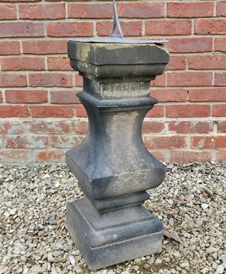 Lot 511 - A Victorian carved stone stepped baluster surmounted by a lead sundial