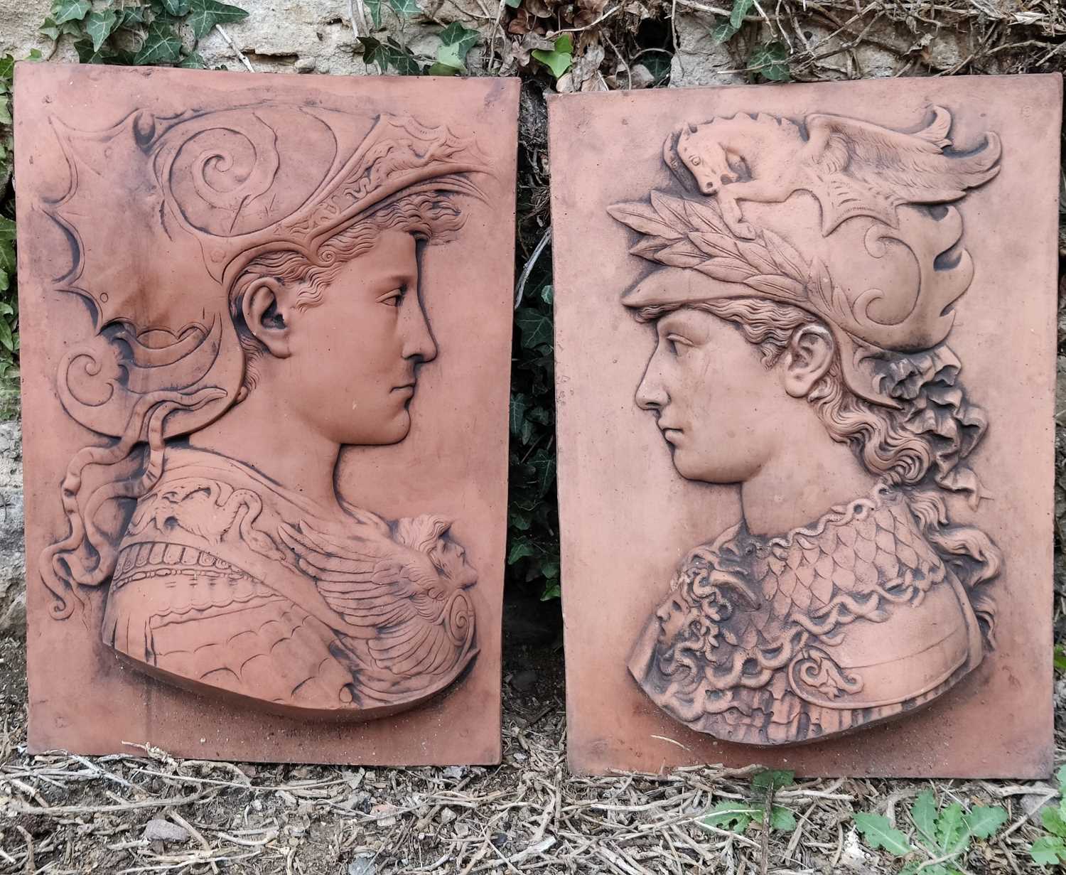 Lot 578 - A pair of cast terracotta wall plaques depicting Renaissance figures in profile