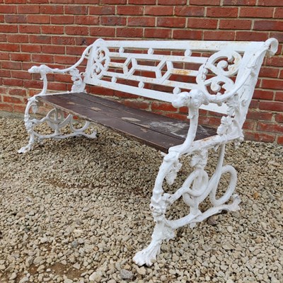 Lot 574 - A Victorian cast iron vine and serpent decorated garden bench