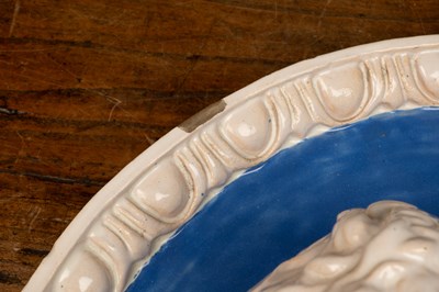 Lot 145 - A pair of Majolica roundels after Cantagali Della Robbia