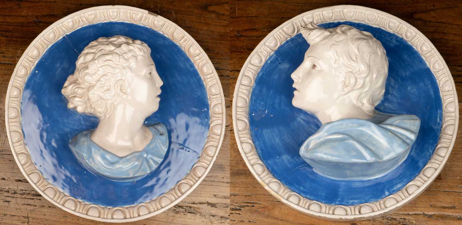 Lot 145 - A pair of Majolica roundels after Cantagali Della Robbia