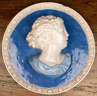 Lot 145 - A pair of Majolica roundels after Cantagali Della Robbia