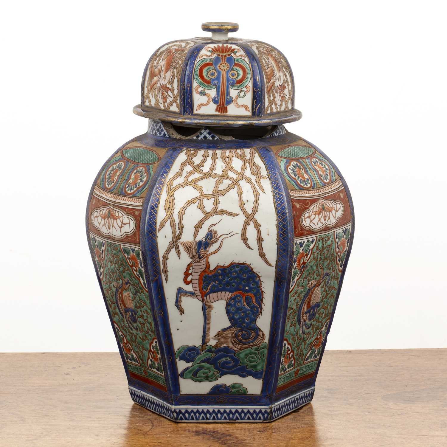 Lot 111 - Arita polychrome hexagonal vase and cover...