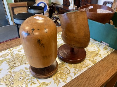 Lot 140 - Two hat blocks and stands