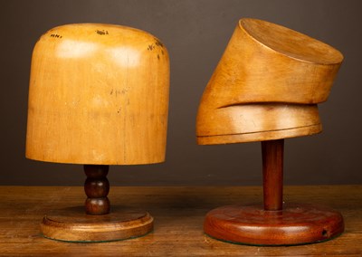 Lot 140 - Two hat blocks and stands