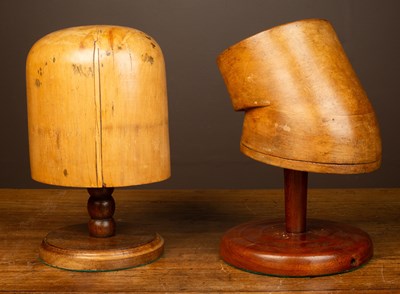 Lot 140 - Two hat blocks and stands