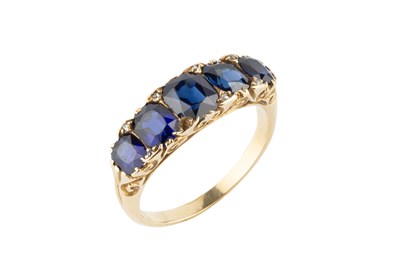 Lot 125 - A sapphire and diamond half hoop ring, the...