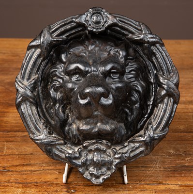 Lot 503 - A cast iron door knocker with lion mask