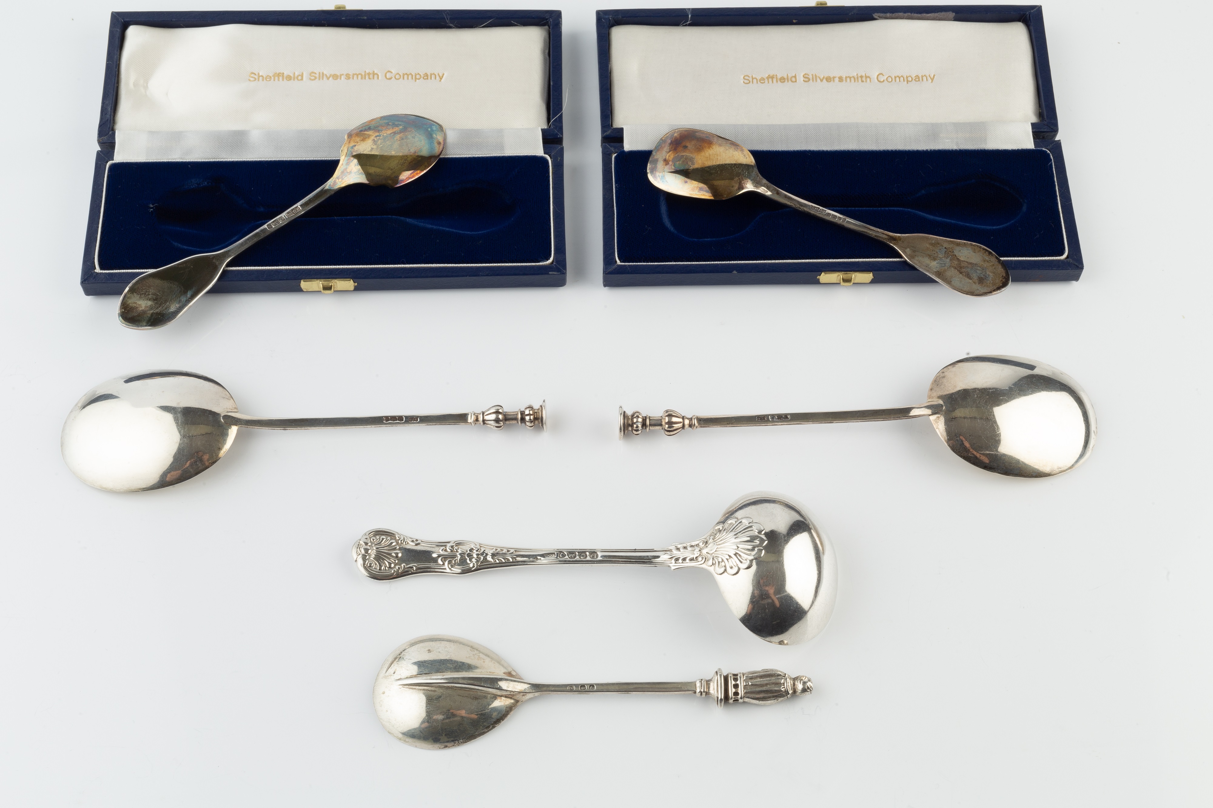 Lot 692 - A pair of George V silver seal top spoons,