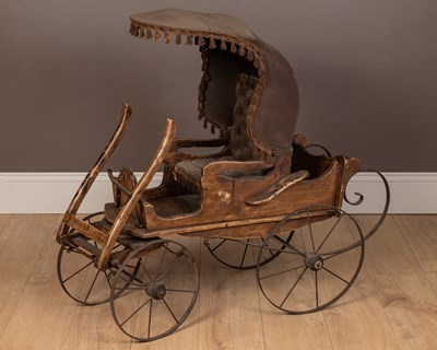 Lot 299 - A child's pram modelled as a miniature horse drawn carriage