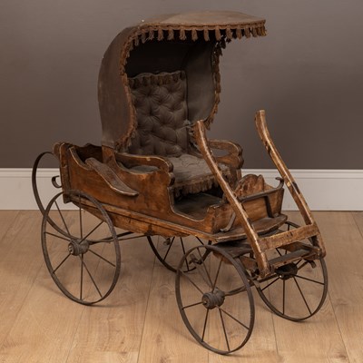 Lot 299 - A child's pram modelled as a miniature horse drawn carriage