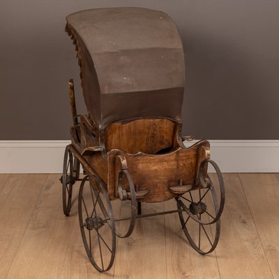 Lot 299 - A child's pram modelled as a miniature horse drawn carriage