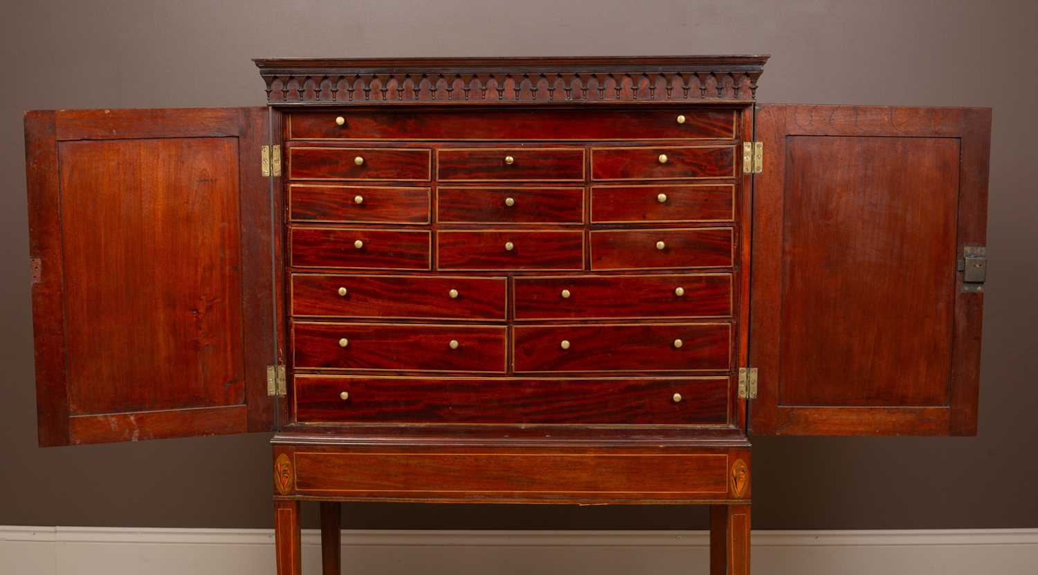 Lot 77 - A mahogany collectors cabinet on stand