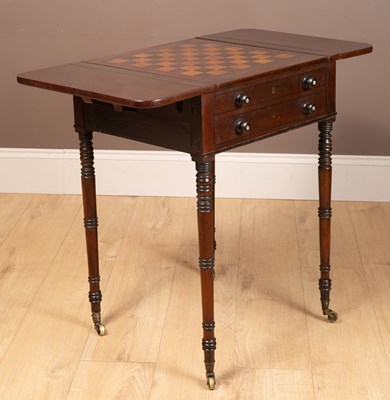 Lot 328 - A Regency mahogany games table