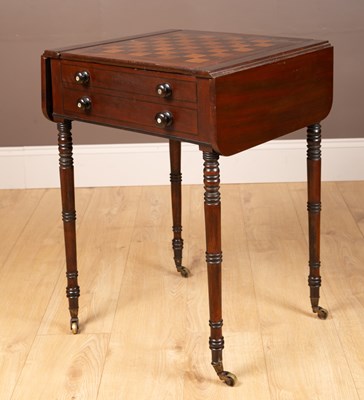 Lot 328 - A Regency mahogany games table