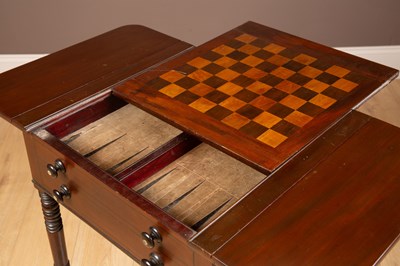 Lot 328 - A Regency mahogany games table