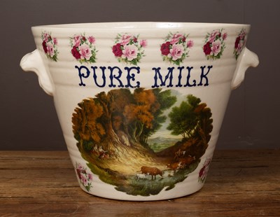 Lot 98 - A two-handled pottery milk pail