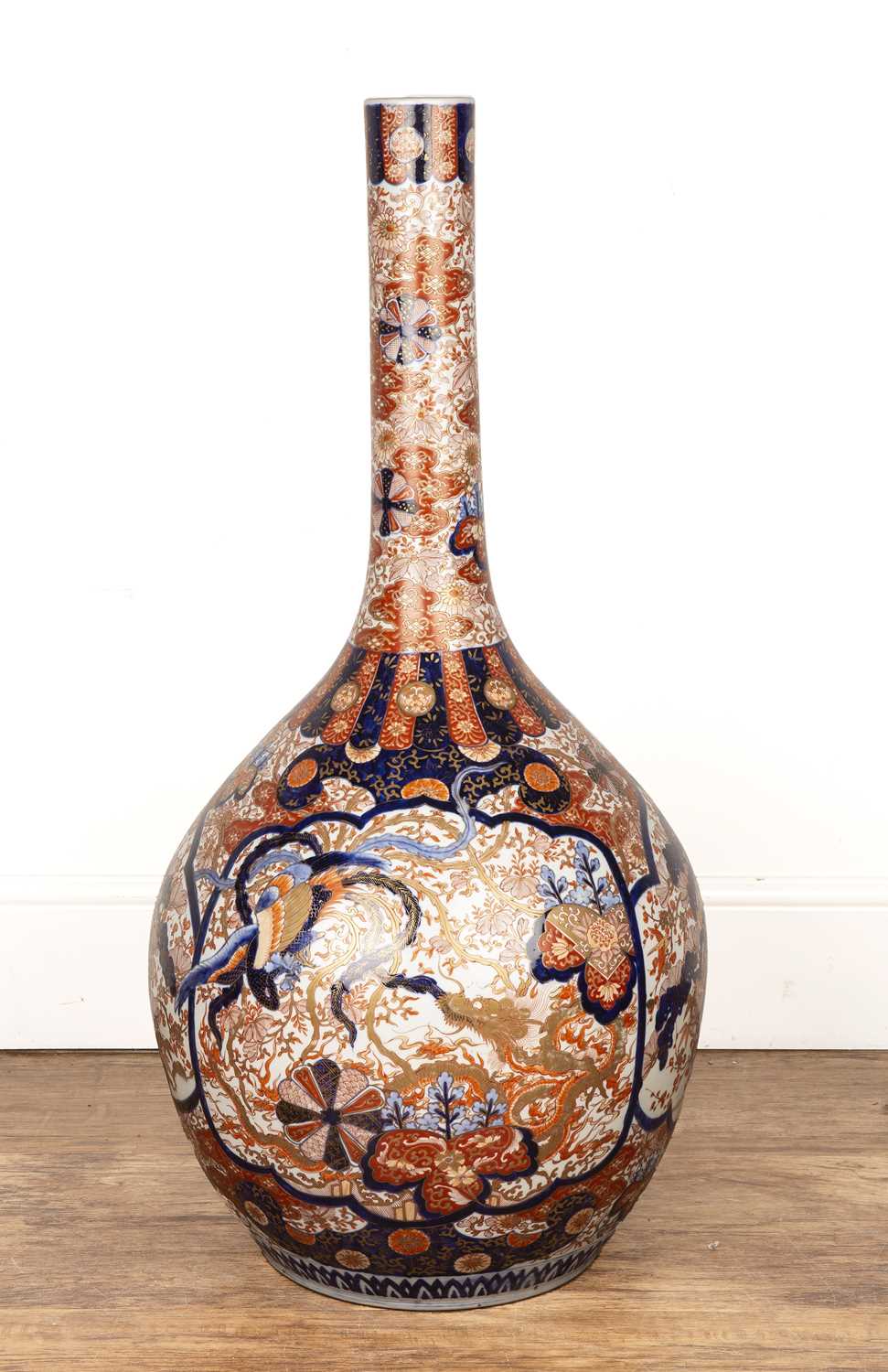 Lot 74 - Large floor-standing Imari bottle vase...