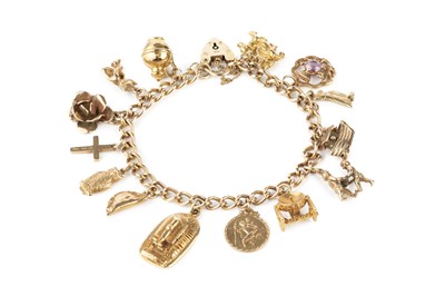 Lot 107 - A charm bracelet, the 9ct gold curb-link...