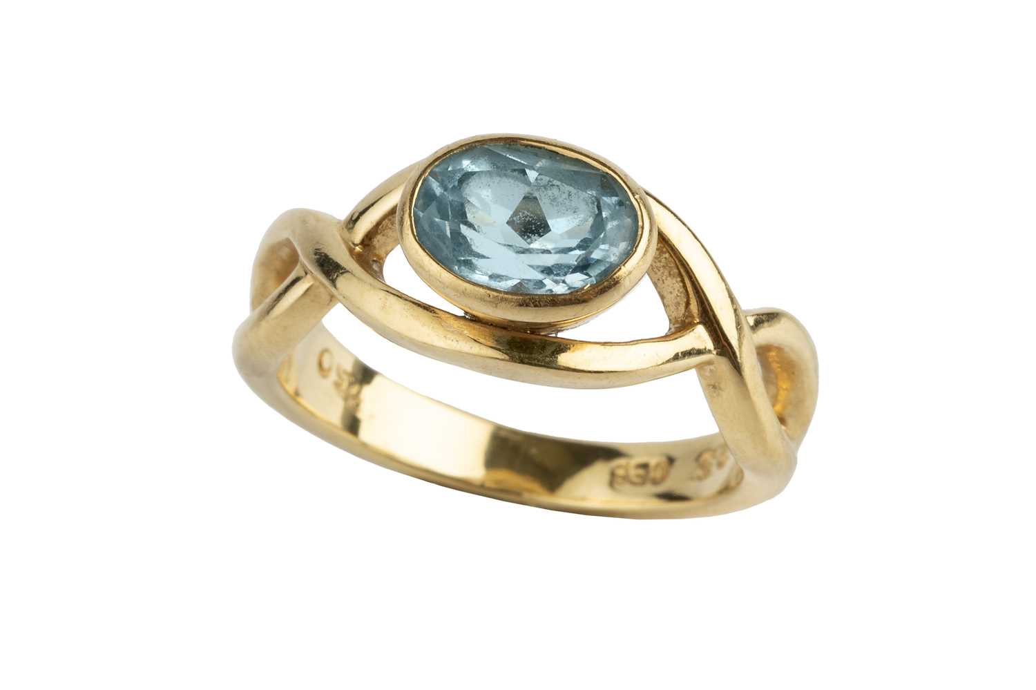 Lot 119 - A blue topaz single stone ring by Catherine...