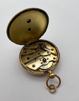 Lot 224 - An open face fob watch, the floral engraved...