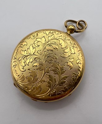 Lot 224 - An open face fob watch, the floral engraved...