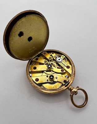 Lot 224 - An open face fob watch, the floral engraved...