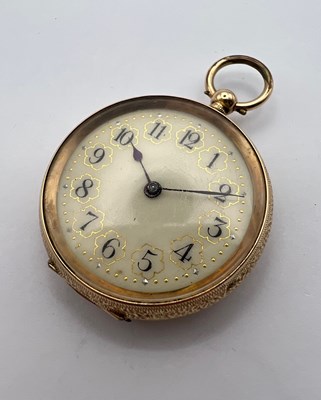 Lot 224 - An open face fob watch, the floral engraved...