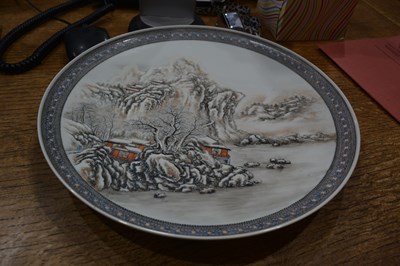 Lot 67 - Pair of white snow scene plates in the manner...
