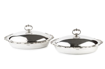 Lot 667 - A pair of Edwardian silver oval entree dishes...