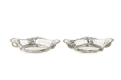 Lot 668 - A pair of Edwardian silver baskets, of shaped...