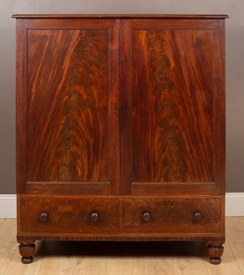 Lot 311 - A mahogany low linen press