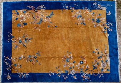 Lot 255 - A Chinese gold ground carpet